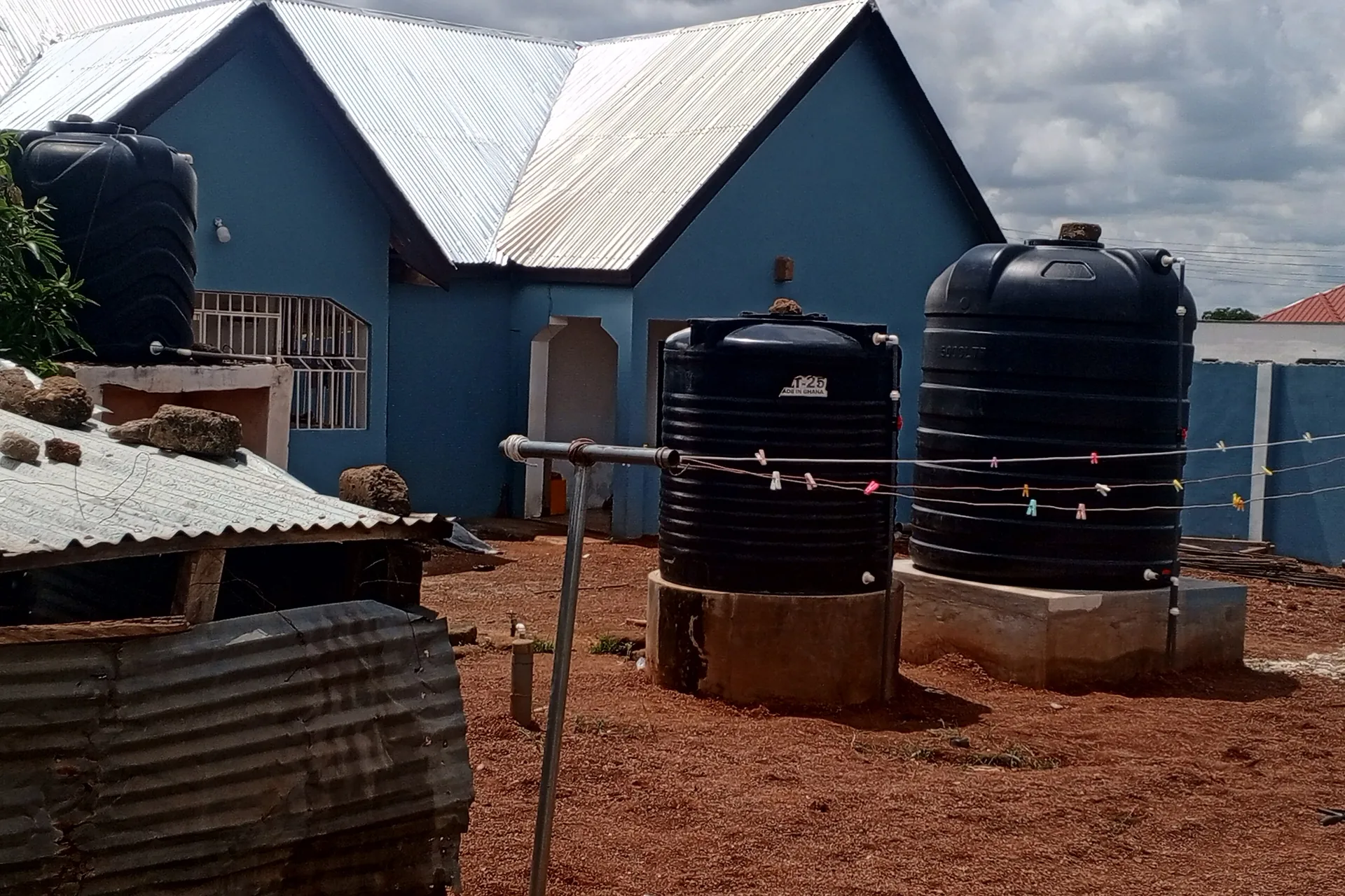 Elevated polyethylene water storage tanks on steel stands